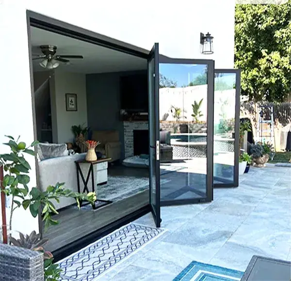 Folding glass patio doors opened to a terrace