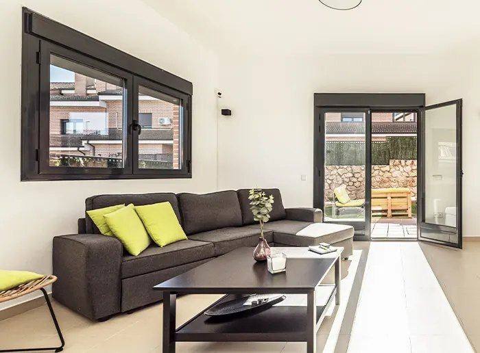 Living Room — Casement window and hinged patio door
